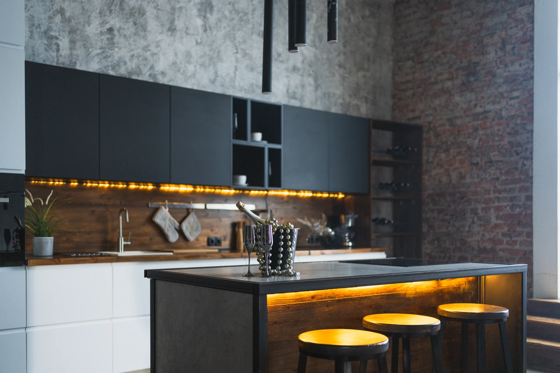 Modern kitchen with warm architectural lighting