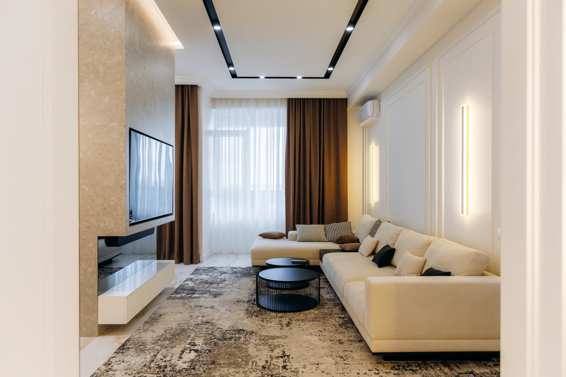 Modern living room with refined neutral finishes
